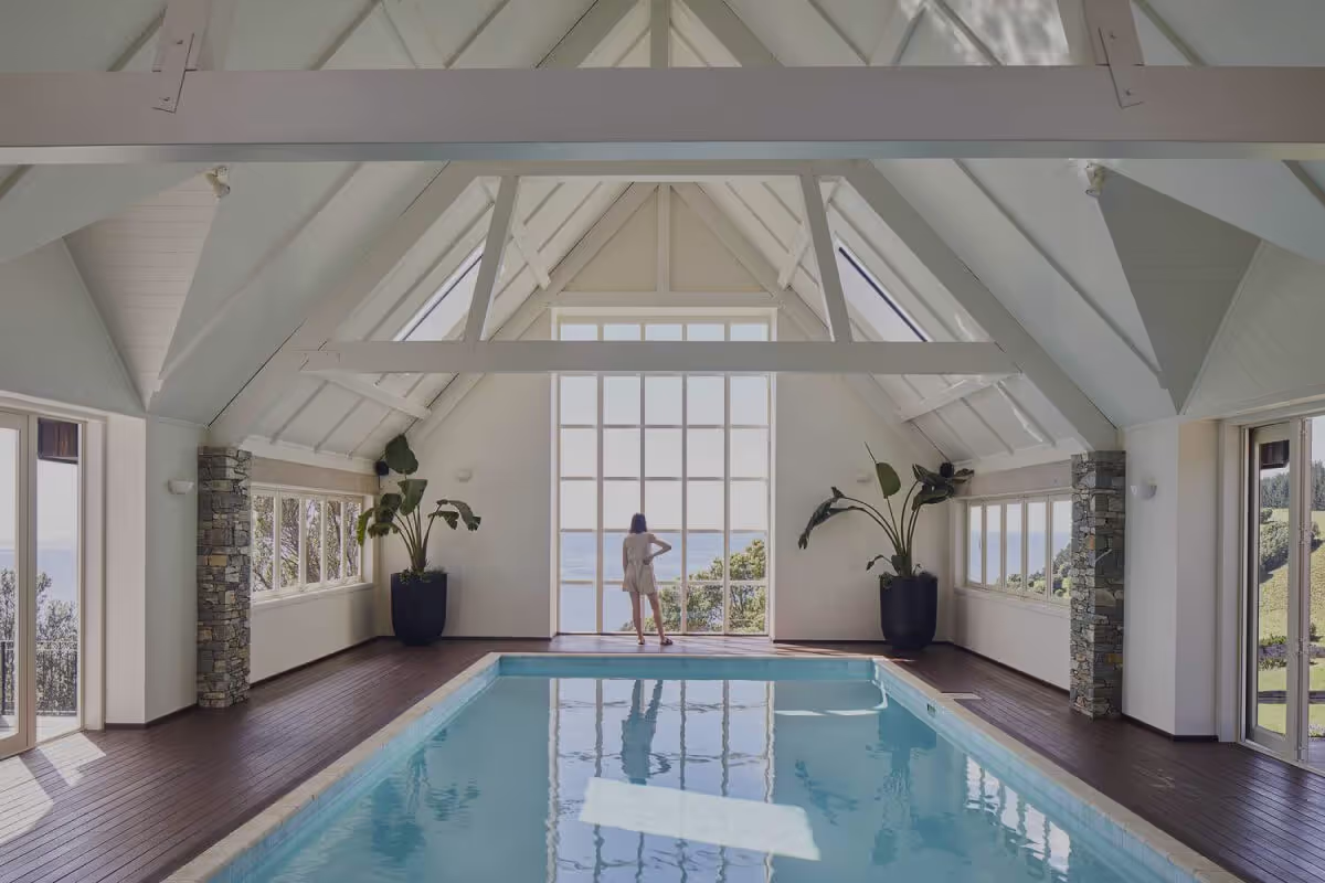 Indoor heated pool with tall windows